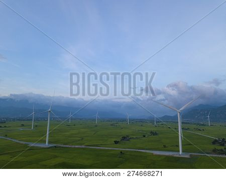 Wind Turbines Farm Or Windmill On A Summer Day. High-quality Stock Photo Image Wind Turbine Or Windm