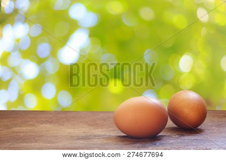 Eggs On Wooden Table. Wooden Background. Food Ingredient.