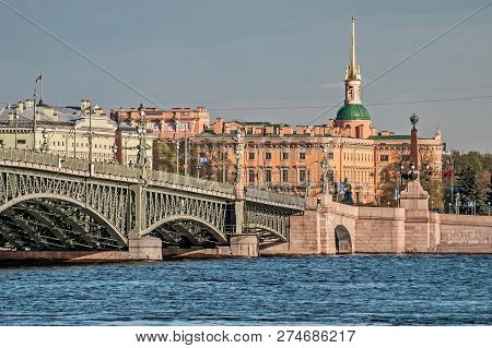 View Of The Neva River And Trinity Bridge On A Sunny Day. Support Of The Trinity Bridge. Walking Aro