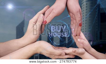 Mens, Womens And Childrens Hands Show A Hologram Buy House