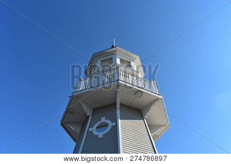Orlando, Florida. November 24,  2018  Top View Of Vintage Lighthouse On Lightblue Sky Background At 