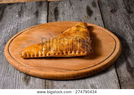 Traditional Georgian Bread - Khachapuri And Kolkh Khachapuri On The Wooden Background.
