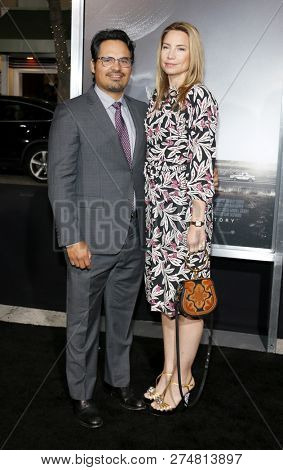 Michael Pena and Brie Shaffer at the World premiere of 'The Mule' held at the Regency Village Theatre in Westwood, USA on December 10, 2018.