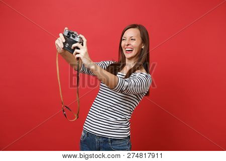 Portrait Of Joyful Beautiful Young Woman Doing Taking Selfie Sho