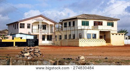 Accra. Ghana - September 17, 2013: Urban View Of A Street With The Old Buildings In Developing Count