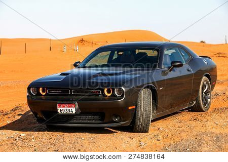 Fujairah, Uae - November 18, 2018: American Muscle Car Dodge Challenger R/t In The Sand Desert.