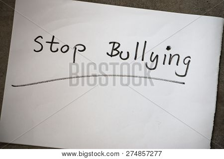 Stop Bullying Text Write On White Paper. Bullying Is Unwanted And Aggressive Behavior. It Considered