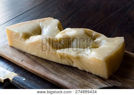 Turkish Traditional Gravyer / Gruyere Cheese From Kars On Wooden Surface