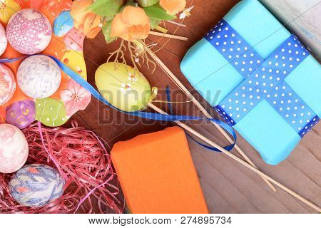 Handcrafted Easter Eggs Close Up, Gift Boxes , Ribbons And Decoration