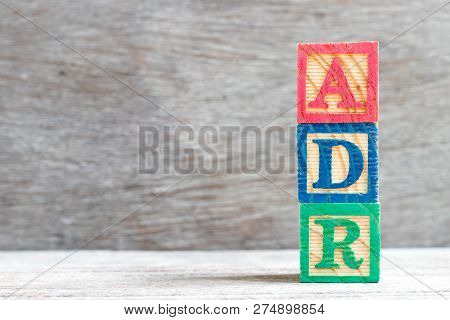 Color Letter Block In Word Adr (abbreviation Of Adverse Drug Reaction) On Wood Background