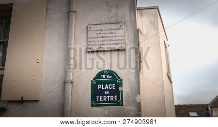 Paris, France - October 6, 2018: Place Du Tertre Panel And A Commemorative Marble Plaque Reminding T