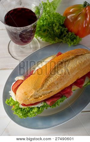 italian sandwich with bresaola cheese and lettuce