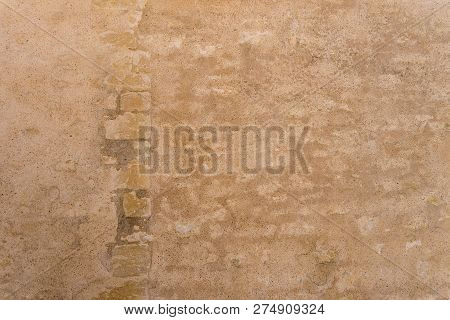Background Of The Ancient Sandstone Bricks And Stones Wall In France