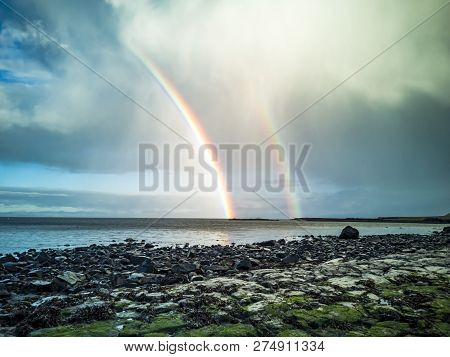Rainbow Above The Famous Dinosaur Bay At Staffin On The Isle Of Skye