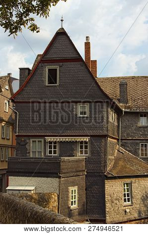 Ancient Wooden Building In Historic Part Of Wetzlar City. The Typical Architecture For This Region. 