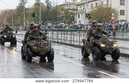 European Street, Prague-october 28, 2018: Soldiers Of Czech Army Are Riding Atv Gladiator X8 On Mili