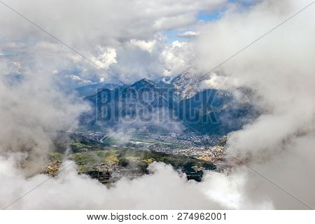 Panorama Of Innsbruck In The Clouds From The Top Of The Mountain