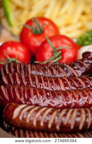 Delicious Grilled Sausages And Vegetable. Delicious Food.