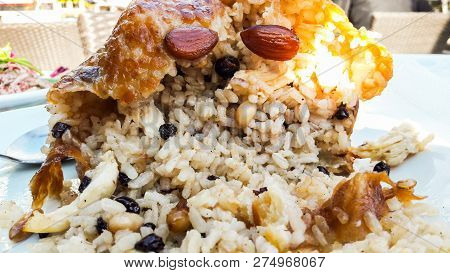 Turkish Perde Pilavi / Drape Pilaf With Chicken, Almond And Raisin.