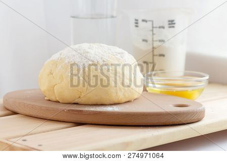Necessary Ingredients For Homemade Dough On The Kitchen Table