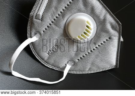 Kn95 Or N95 Mask With Valve For Protection Pm 2.5 And Corona Virus On Black Background. Prevention O