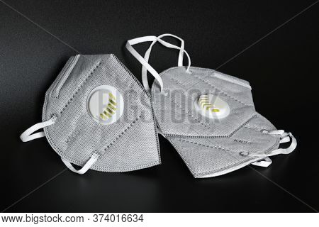 Kn95 Or N95 Mask With Valve For Protection Pm 2.5 And Corona Virus On Black Background. Prevention O