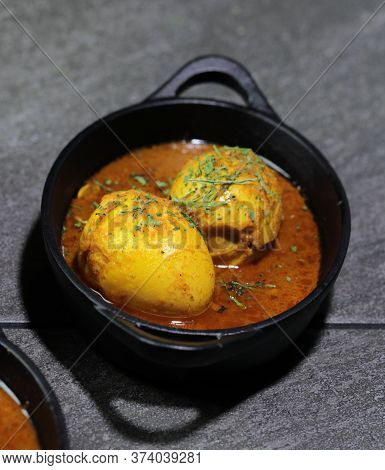 An Indian Spread Of Spicy Egg Curry Or Egg Masala In A Bowl