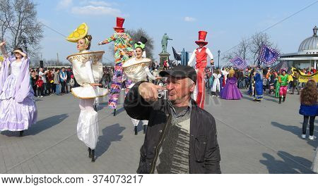 Odessa, Ukraine - 04 01 2019: Reporting Old Photographer In Front Of Puppet Princesses In White Clot