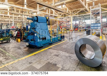 Roller Forming Machine. The Interior Of The Plant Producing A Metal Profile. Sheet Metal Processing.