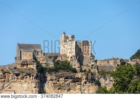 The Medieval Chateau De Beynac Rising On A Limestone Cliff Above The Dordogne River. France, Dordogn
