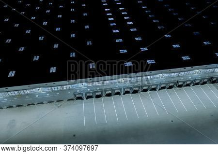 Night Loading Dock At A Warehouse. Modern Logistics Center. Docking Stations Of A Distribution Cente