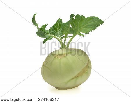 Fresh Kohlrabi With Green Leaves Isolated On A White Backround