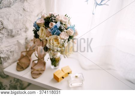 Bridal Bouquet Of White And Pink Roses, Babys Breathe, Scabiosa, Hortense And White Ribbons In A Bri