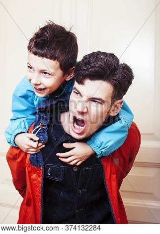 Faher And Son Together Having Fun At Home, Lifestyle Happy Family, People At Home
