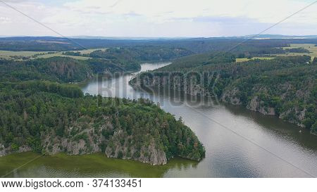 Aerial View Of Confluence Of Two Rivers Vltava And Otava Next To Medieval Castle Zvikov In Czech Rep
