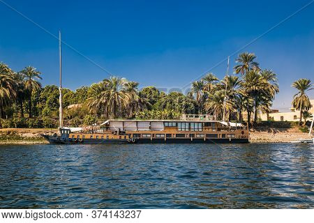 Luxor, Egypt - Jan 28, 2020:The touristic boats on Nile river in Luxor city, Egypt