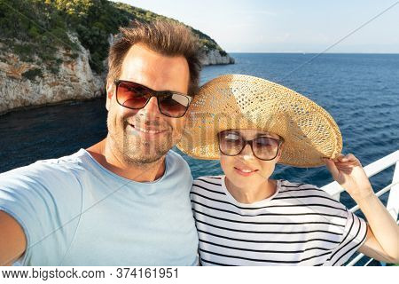 Beautiful, Romantic Caucasian Couple Taking Selfie Self Portrait Photo On Summer Vacations Traveling