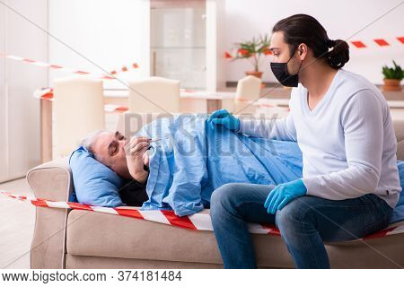 Father and son in coronavirus disease concept at home