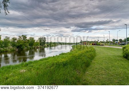 Boulevards On Narew River In The Evening In Lomza.