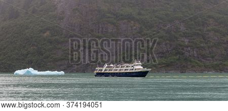 Tracy Arm Fjord, Alaska, Us - August 23, 2018: National Geographic's Sea Bird Vessel Drifting With A