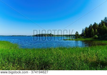 Scenes Of The Beautiful Siljan Lake And Its Rural Surrounding On A Sunny Summer Morning.