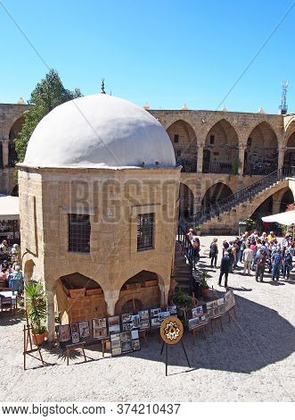 Paphos, Cyprus - March 17, 2018: A Group Of Tourists In The Old Souk In Nicosia Cyprus Surrounded By