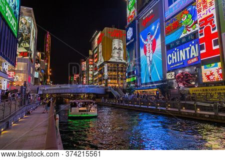 Osaka, Japan - September 22 2015: Dotonboti street in Namba is the best sightseeing attraction and famous place in Osaka with colorful and billboard light around area in Osaka, Japan