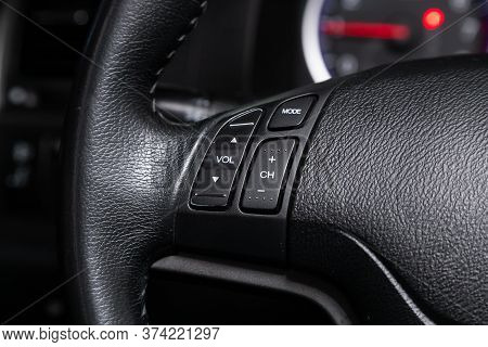 Novosibirsk/ Russia - April  11 2020: Honda Cr-v, Car Steering Wheel With Control Buttons, Music Vol