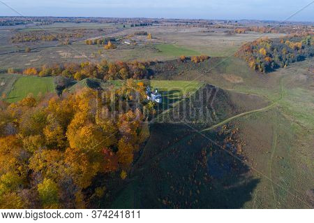 View Of Truvor Hillfort In Golden Autumn (aerial Photography). Izborsk, Russia