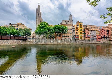 Girona Cathedral And Houses Along Onyar River, Spain