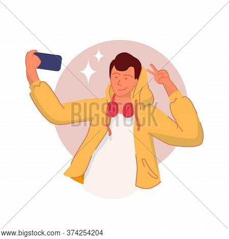 Man Taking Selfie. Young Man Posing And Taking Selfie Photo Using Mobile Phone Gadget Or Having Vide