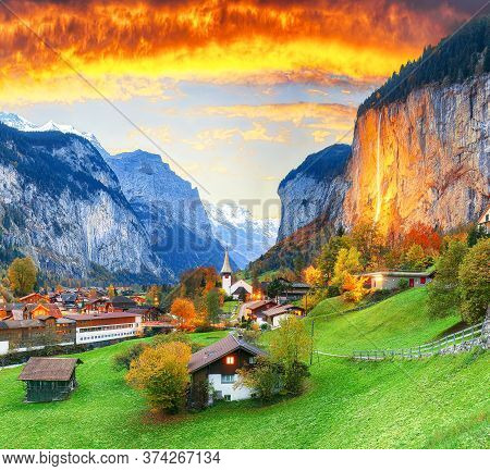 Captivating Autumn View Of Lauterbrunnen Valley With Gorgeous Staubbach Waterfall And Swiss Alps At 