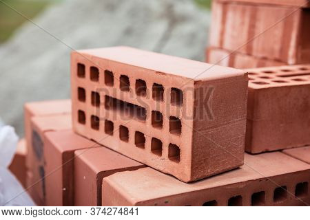 Stack Of Old Red Bricks. Building Of The House