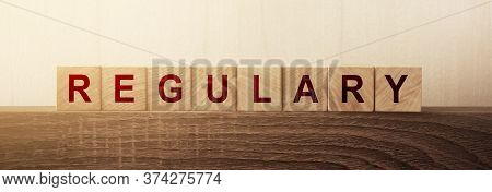 Wooden Blocks With The Word Regulary. Setting Rules, Laws. Legislation. Religious And Folk Tradition